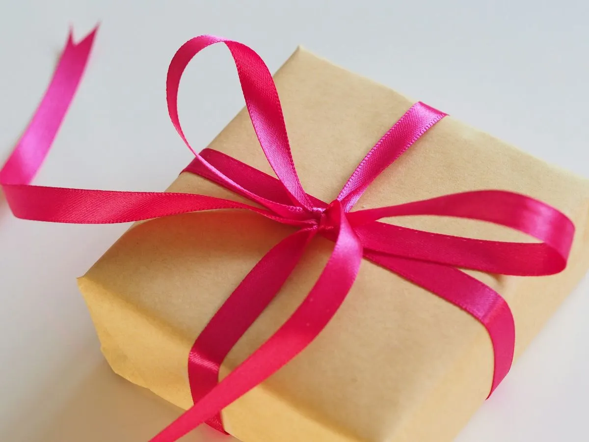A kraft paper gift box tied with a ribbon